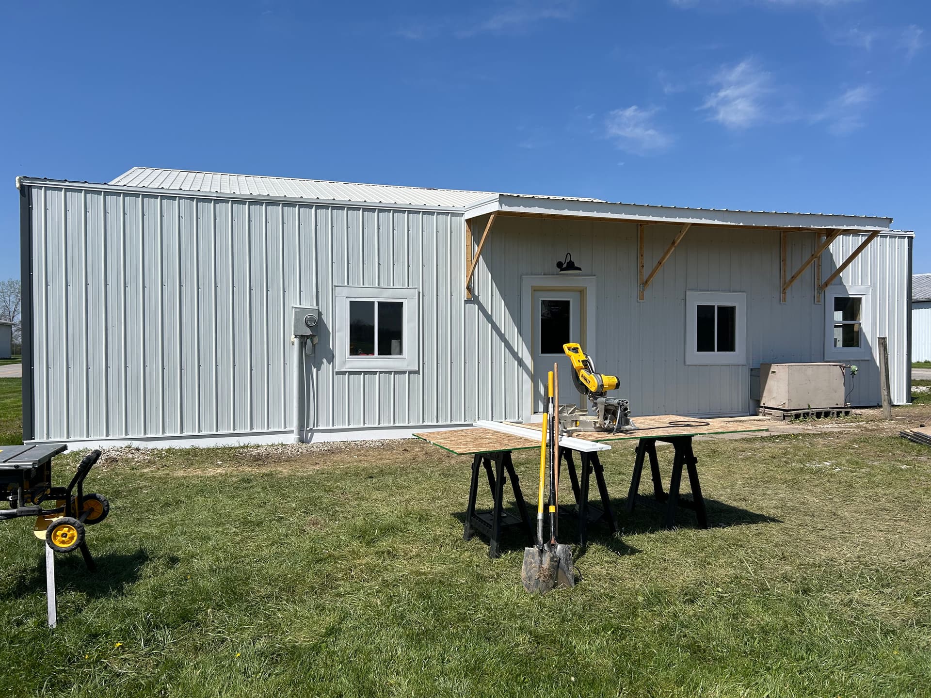 Gallery photos for Full exterior wall remodel with metal siding insulation and awning: Image #3