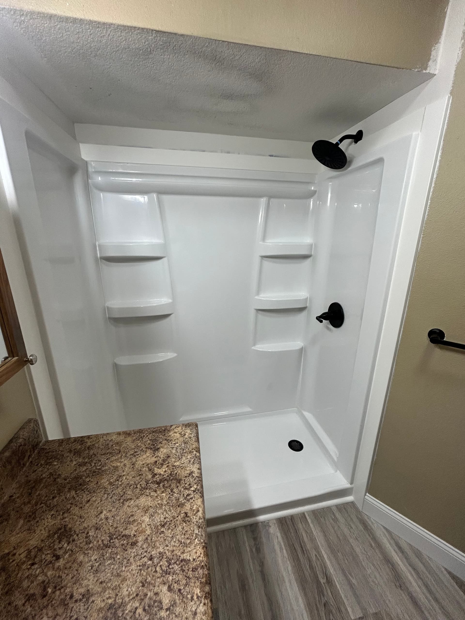 Shower Swap and Fresh Flooring in Montpelier