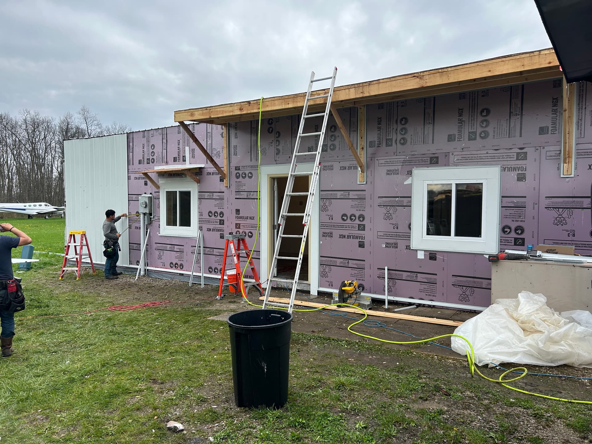 Gallery photos for Full exterior wall remodel with metal siding insulation and awning: Image #1